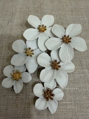 SHASHI White Floral Drop Earrings with Gold Centers